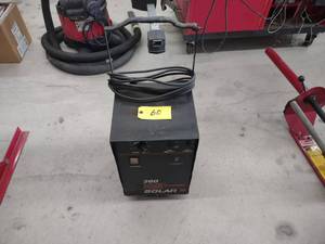 lot 60 image: Solar 612 Volt Battery Charger...
