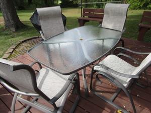 Patio table 42x60, four chairs...