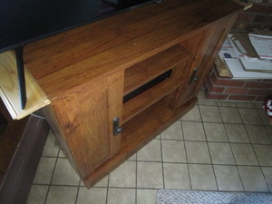 Corner TV stand, 36 across front...