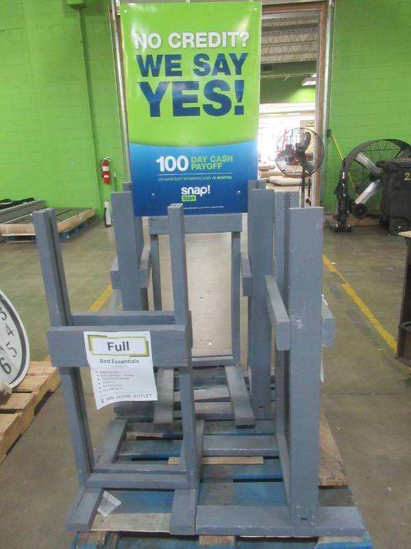 lot 558 image: Large Pallet of Miscellaneous Items Left over from the Retail Store and Warehouse. Wooded FlooringSignage Display Racks Approximate Dimensions 18 x 24 x 43 Tall.