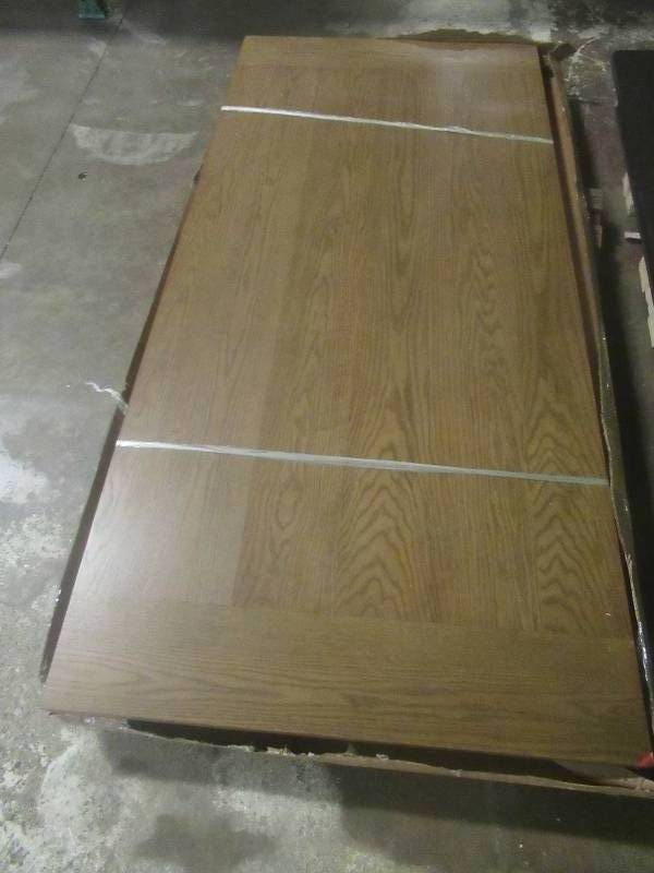 lot 199 image: CREATED FOR MACYs JGW FURNITURE, Solid Wood Table Top In Oak Finish. Some Corner Damage (See Photos). Approximate Dimensions 88 X 40.