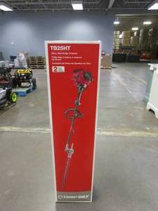 lot 310 image: TROY BILT 22 in. 25 cc Gas 2-Stroke Articulating Hedge Trimmer with Attachment Capabilities (APPEARS TO BE BRAND NEW)