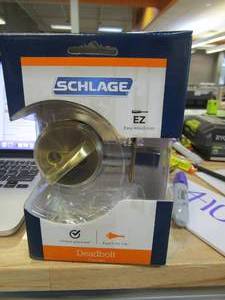 lot 410 image: SCHLAGE Satin Brass Single Cylinder Deadbolt - 2 PACK
