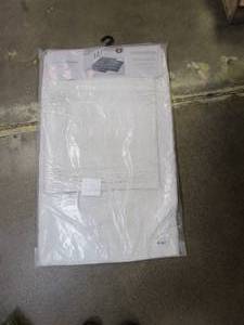 lot 385 image: MODERN THREADS 2-Pack Relax White 21 in. x 34 in. 100% Cotton Bath Mat (NEW IN PACKAGING)