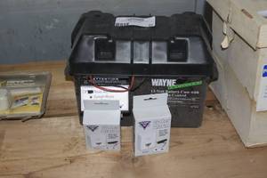 Wayne 12 volt battery case with solid state control and water alarms