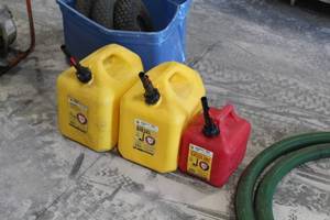 lot 330 image: (2) Diesel 5-Gallon Cans and (1) Gasoline 2-Gallon Can