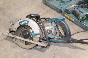 lot 344 image: Makita 5377MG 7-14 Worm Saw
