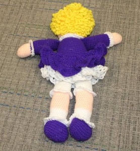 lot 86 image: Minnesota Vikings Crochet 2 Foot Tall Doll w 1976 Button