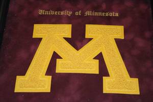 lot 87 image: Framed Minnesota Gophers Varsity Letter