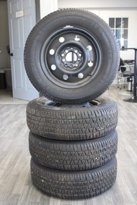Set of Tires on Universal Wheels - P19570R14