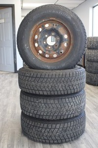 Set of Tires on Wheels 22570R16