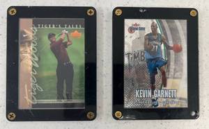 lot 27 image: Fleer Gametime Kevin Garnett Card And Upper Deck Tiger Woods Tiger Tales trading cards In Acylic Protectors -