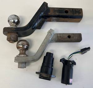lot 47 image: Misc. Trailer Hitch Inserts With 2 Balls And Trailer Male And Female Light Connectors -