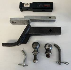 lot 49 image: Misc. Trailer Hitch Inserts With Balls, Trailer hitch adapter And Pins Ball Sizes Are 2  2 -