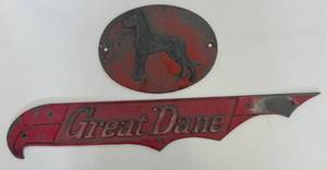 lot 89 image: Antique Great Dane Casted Metal Semi Truck Emblems (Man Cave Dcor) -