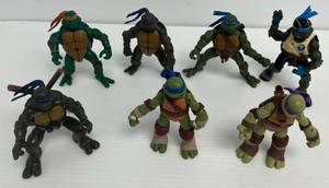 lot 155 image: TMNT Action Figures Some Missing Weapons