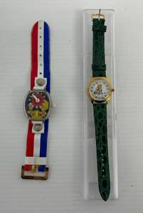 lot 160 image: Vintage Merry Toys Teeter Totter Watch (Works, Part Of Buckle Missing ) And Vintage Minnesota State Fair Watch (Needs Battery)