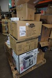 lot 202 image: Pallet of Repairables - Ice Maker, Hoverboard, Microwave, Massage Guns
