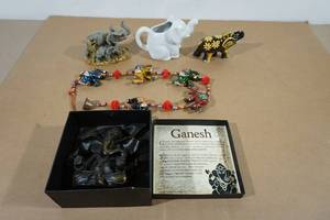 lot 85 image: Assorted Elephant Figurines and Bell