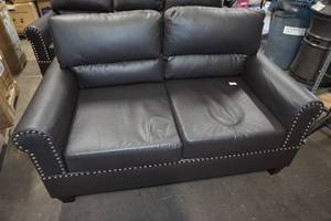 lot 46 image: Venetian Worldwide Faux Leather Loveseat