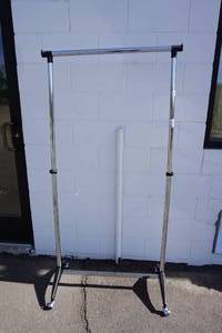 lot 12 image: Modern Adjustable Rolling Garment Rack