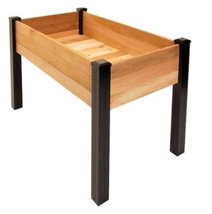 lot 506 image: Outdoor Essentials 24 x 45 12 x 31 34 Tall,  Elevated Cedar Garden Planter With Vinyl Legs. Appears to be Complete - SOLD AS IS