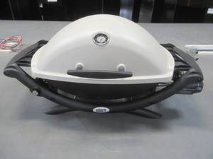 lot 572 image: Weber Portable Propane Table Top Grill - USED,  Miissing Grates