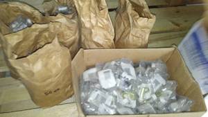 lot 310 image: Hundreds of Hinged Doorstops.