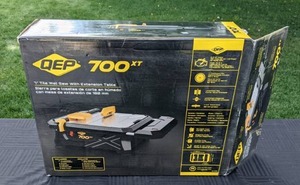 lot 10 image: QEP 700XT 34 HP Wet Tile Saw with 7 in. Blade and Table Extension