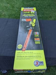lot 32 image: Ryobi One 18V 22 in. Cordless Battery Hedge Trimmer (Tool Only)