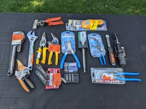 lot 99 image: Large Assortment of New Tools Hex Key Set, Various Wrenches, Fiskars Pruner, Tin Snips, Stud Sensor, and Much More
