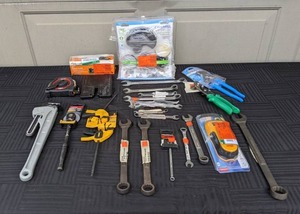lot 144 image: Buck Bros 7 in. Block Plane, Dremel Versa 4-Volt Cordless Lithium-Ion Max Power Scrubber Cleaning Tool Kit, Zircon StudSensor HD55 Stud Finder, Pipe Wrench, Ratcheting Combination Wrenches, 100 Ft. Tape Measure and More