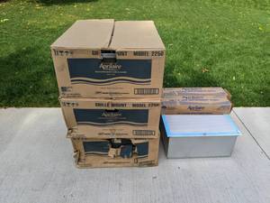 lot 209 image: (3) Aprilaire High Efficiency Air Cleaners, (2) Aprilaire Air Cleaner Replacement Media, Aprilaire Grill Mount Air Cleaner