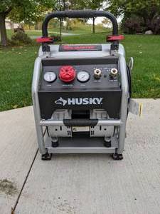 lot 125 image: Husky 4.5 Gal Portable Electric Silent Air Compressor