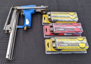 lot 203 image: Pneumatic Staple Gun and (2) Paslode Trim and Stapler Fuel Pkgs., (1) Paslode Framing Fuel Pkg.