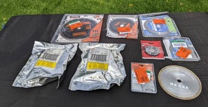 lot 184 image: 3M 89628 Fiber Disc 787C 5 in. x 78 in. 36, RIDGID 10 In. WetDry Segmented Diamond Saw Blade, RIDGID 7in. WetDry Continuous Rim Diamond Saw Blade, AvantiPro 7 in. Diamond Saw Blade, Husky Cut-Off Disc and More