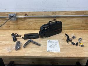 lot 96 image: PANASONIC OmniMovie VHS Movie Video System (#9-9806)