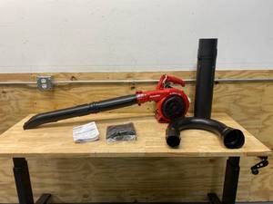 lot 57 image: HOMELITE 150 MPH 400 CFM 26cc Gas Handheld Blower Vacuum