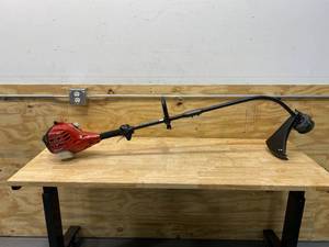 lot 59 image: HOMELITE 2-Stroke 26 cc Curved Shaft Gas Trimmer