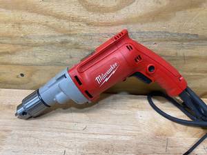 lot 73 image: MILWAUKEE 8 Amp 12 in. Magnum Drill