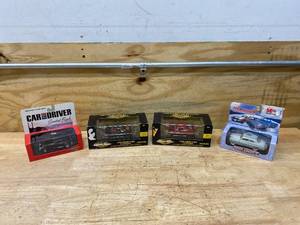 lot 81 image: Lot of 4 Diecast Collectible Cars