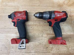 lot 114 image: MILWAUKEE M18 FUEL 18V Lithium-Ion Brushless Cordless 14 in. Hex Impact Driver (2853-20) with M18 FUEL 12 Hammer DrillDriver (2704-20)- Tools Only