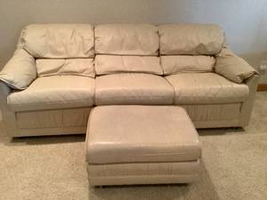 Cream Colored Sofa and Ottoman