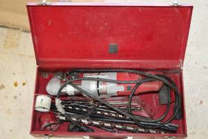 lot 981 image: Milwaukee 12 Drill with Drill Bits, Metal Case