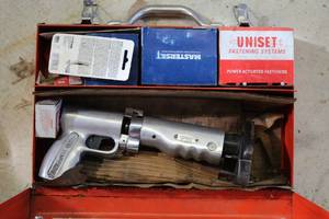 lot 986 image: Speed Fastener Corp .22 cal Stud Driver Powder Actuated Tool with Metal Case and .22 cal Powder Actuated Fasteners