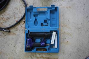 lot 1001 image: Central Pneumatic Air Nailer with Case
