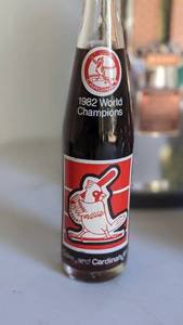 lot 13 image: Baseball Lovers Collection-Autographed Baseball, 1982 Cardinals Coke Bottle & More