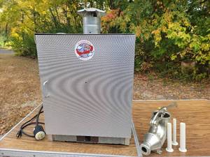 lot 07 image: The Sausage Maker- 20 Lb, 120 V Household Meat and Fish Smoker -Comes in it Box