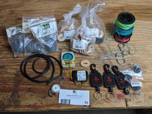 lot 93 image: Cabelas Fishing Line, Key Chains, Leather Handle Components & More