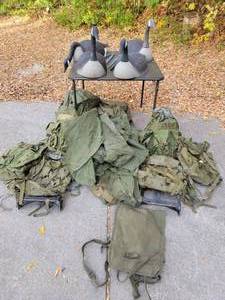 lot 165 image: 4 Duck Decoys, 6 Army Backpacks, & 5 Insect Covers